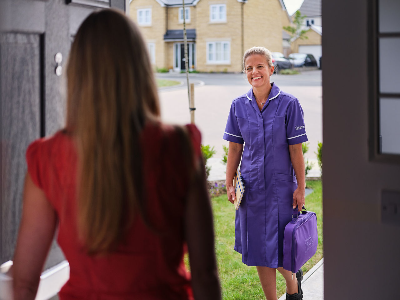 Nurse at Patient Door