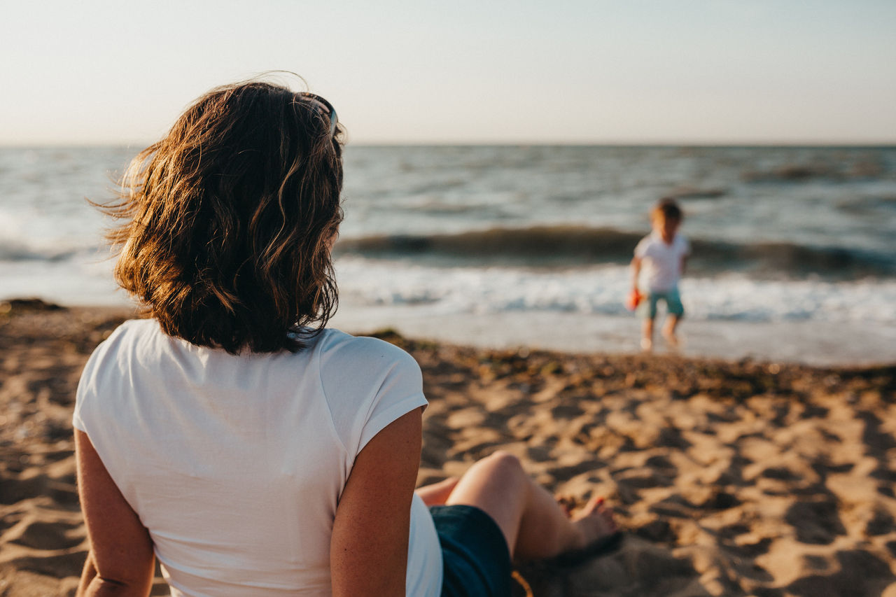 Mom and child on the beach